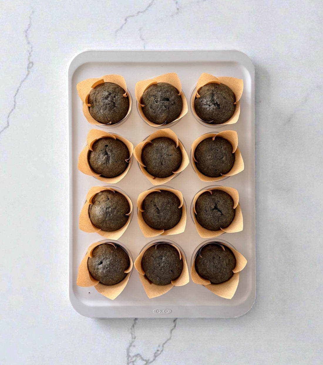 Black Sesame Banana Muffins with Cream Cheese Frosting