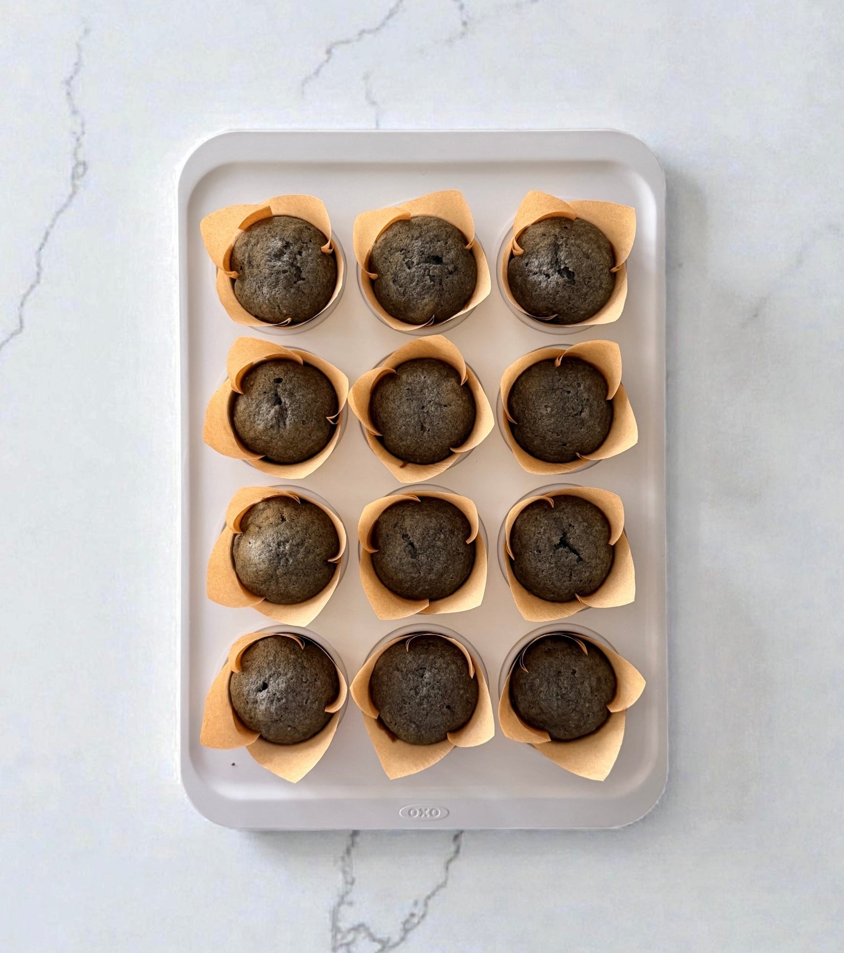 Black Sesame Banana Muffins with Cream Cheese Frosting
